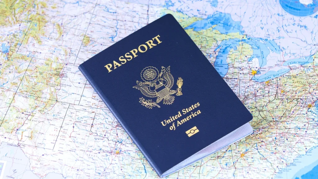 Passport lying on a printed road map